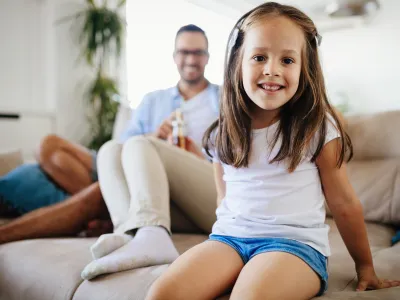 Young little girl enjoying time with her parents